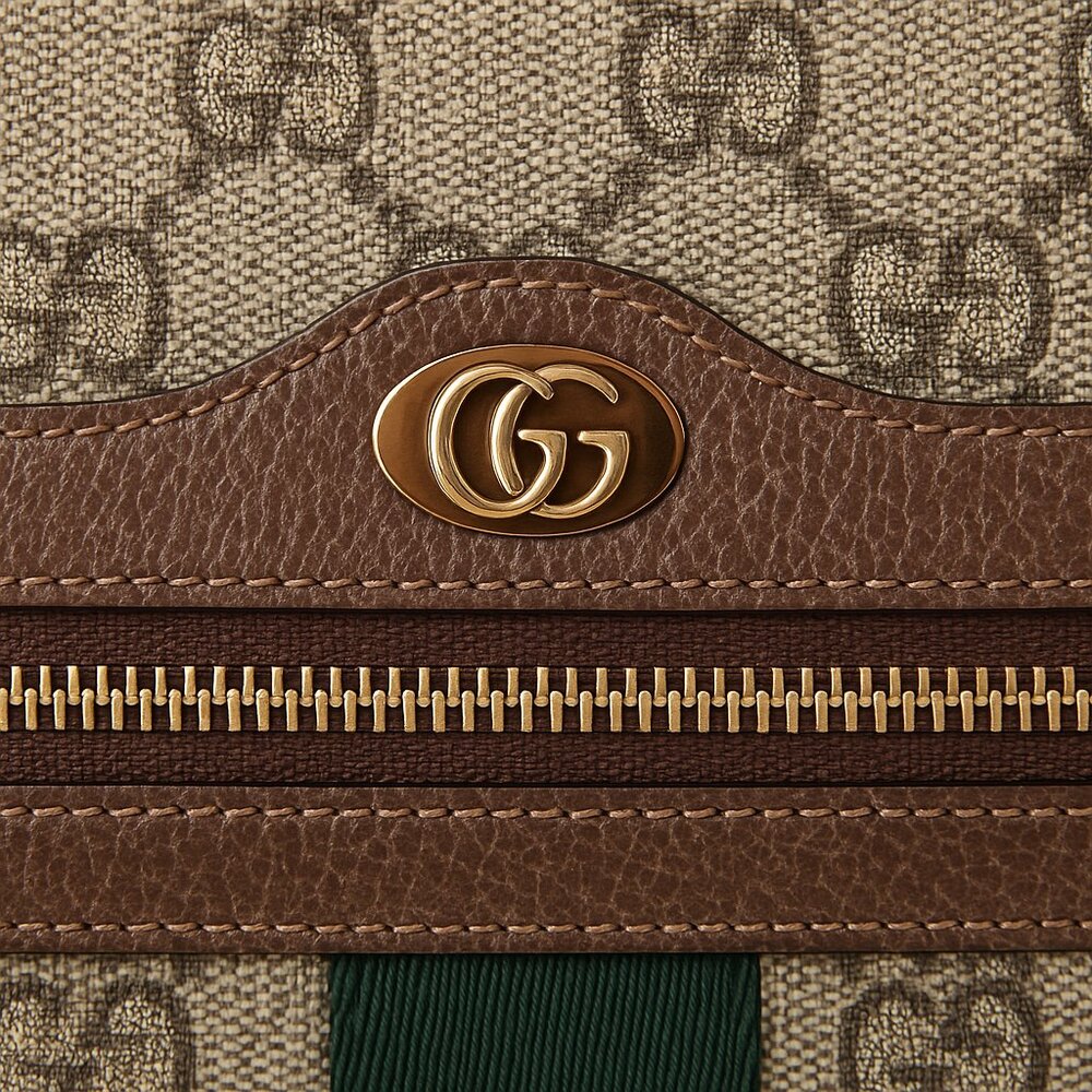 Gucci GG Supreme Clutch Bag