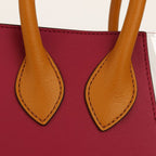 Pour La Victoire Handbag