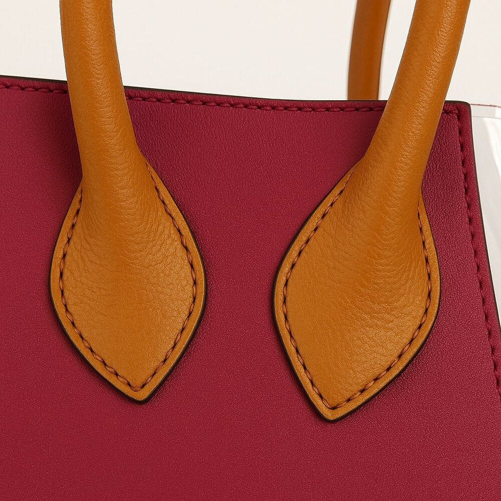 Pour La Victoire Handbag