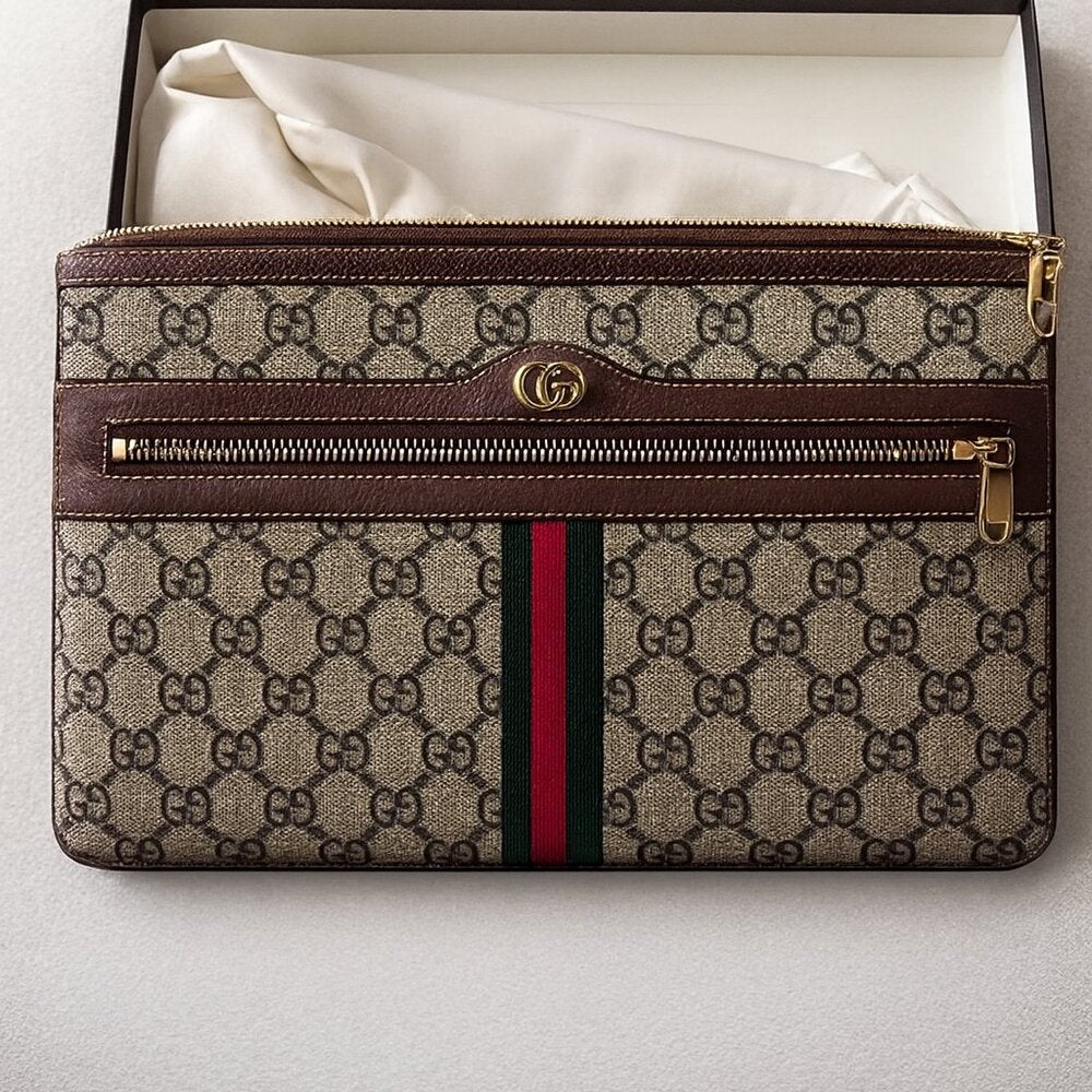 Gucci GG Supreme Clutch Bag